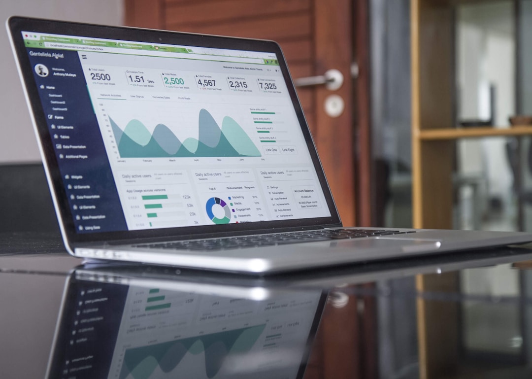 Laptop displaying data analysis charts and graphs illustrating statistical variance.
