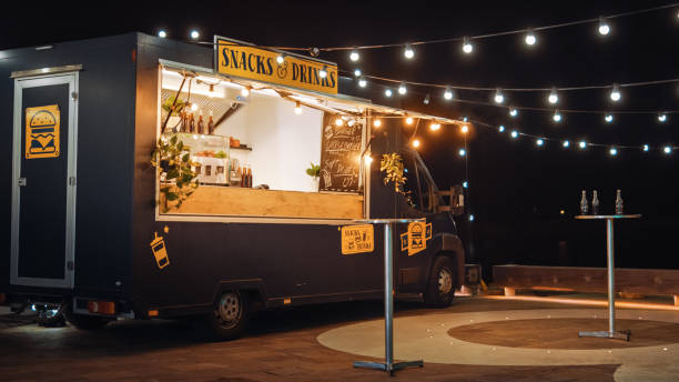 Mobile kitchen restaurant truck with snacks and drinks, illustrating a food truck business.
